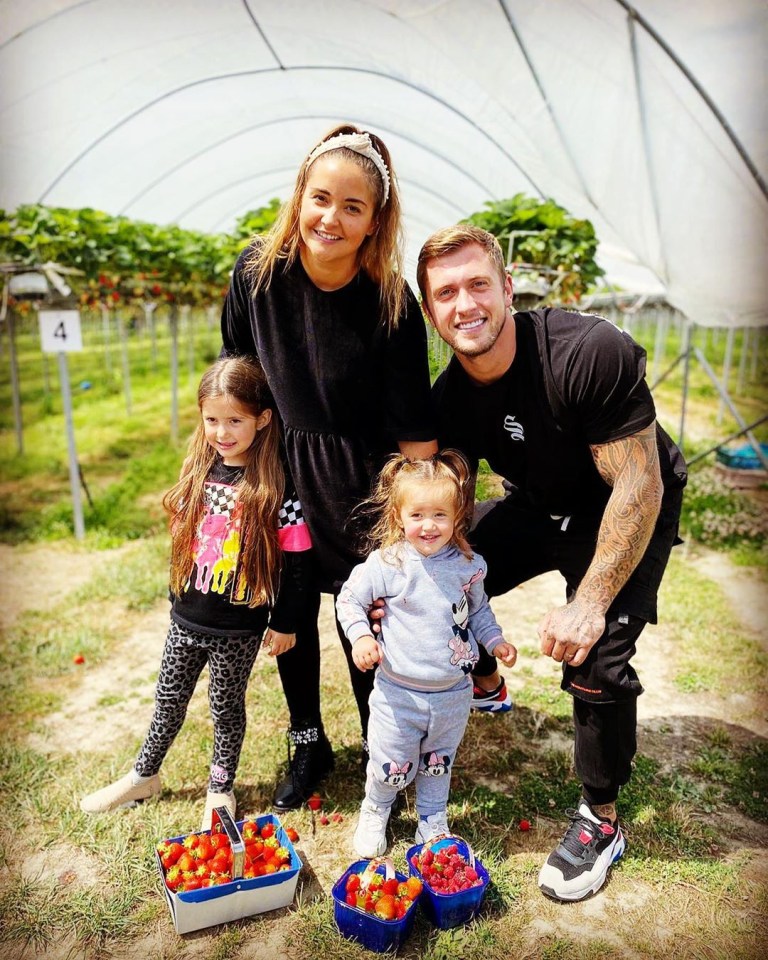 Jac and her husband Dan Osborne with their daughter Ella and Mia