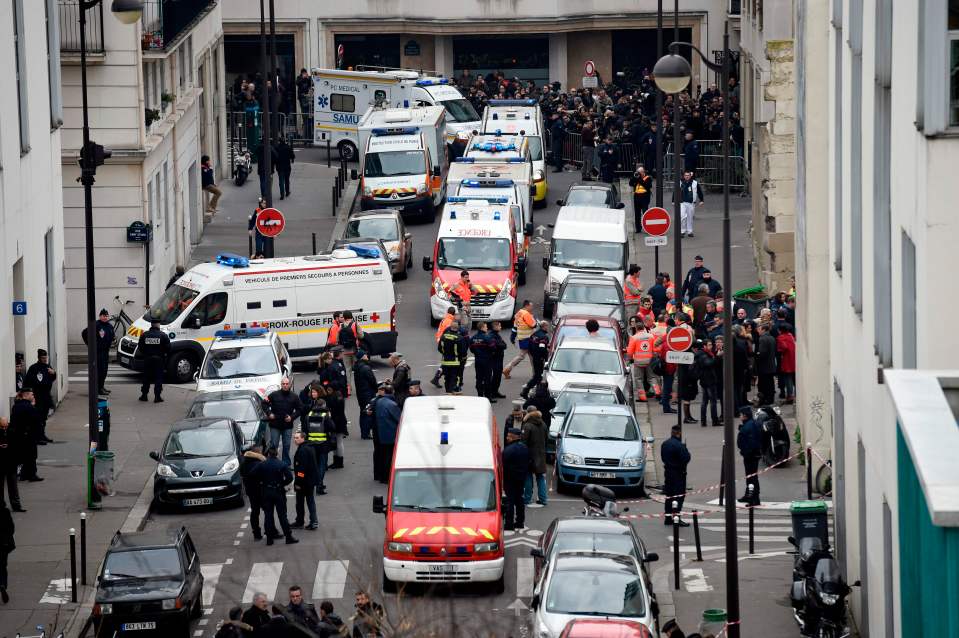 Emergency crews outside the offices of Charlie Hebdo after the atrocity