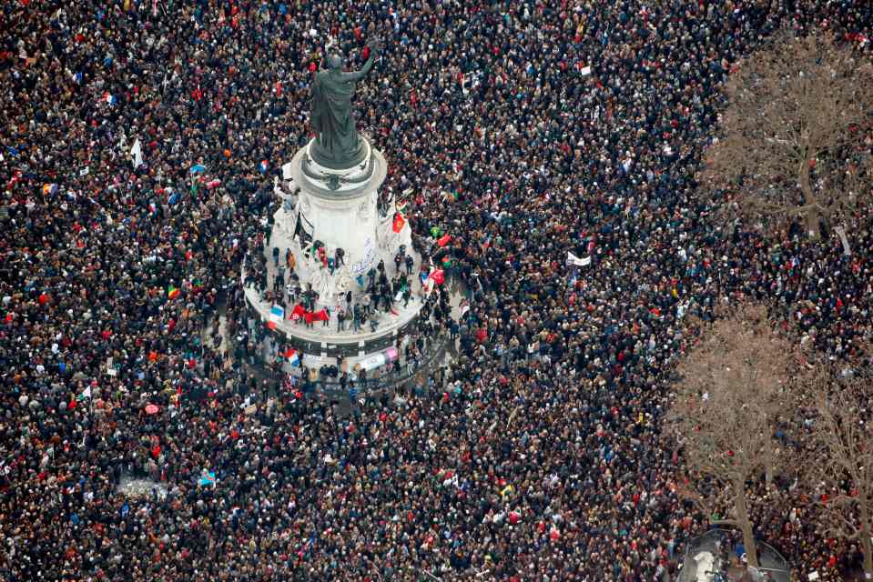 Thousands gathered in the Place de la Republique to pay their respects to those who died