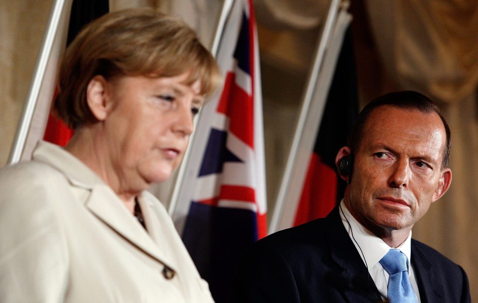 German Chancellor Angela Merkel and Tony Abbott attend a press conference at Admiralty House on November 16, 2014