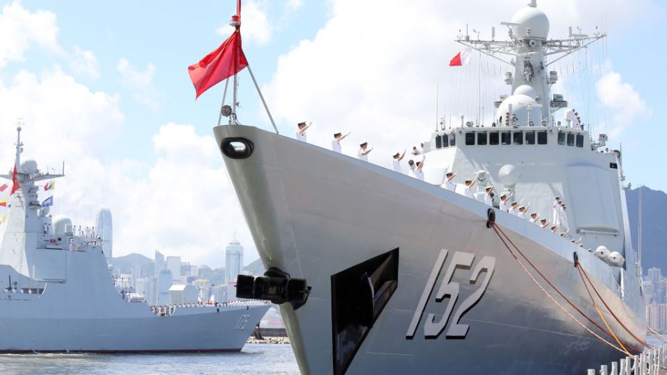 Sailors on the deck of one of the new Type 052D destroyers