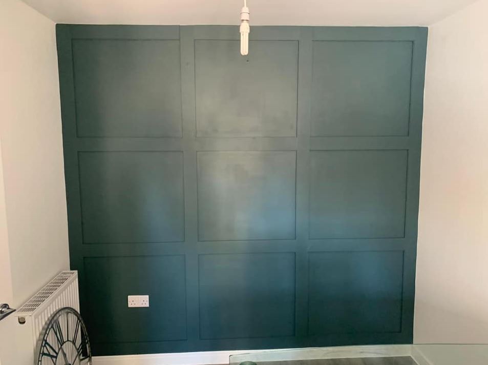 A family showed how they gave their kitchen dark panelling for £25 using B&Q MDF