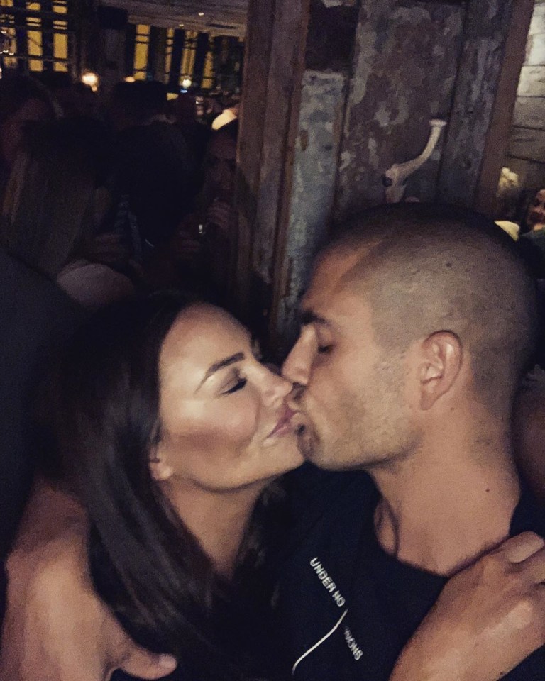 Max sharing a kiss with Stacey