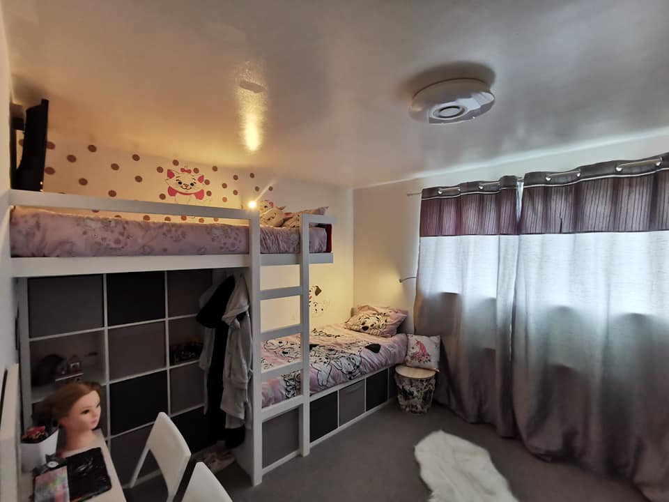 The other side has modern bunk bed and covered in 101 Dalmatians with extra storage 