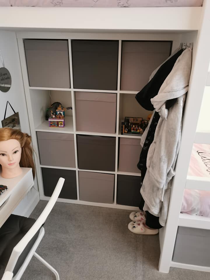 The storage cubes fit nicely under the bed