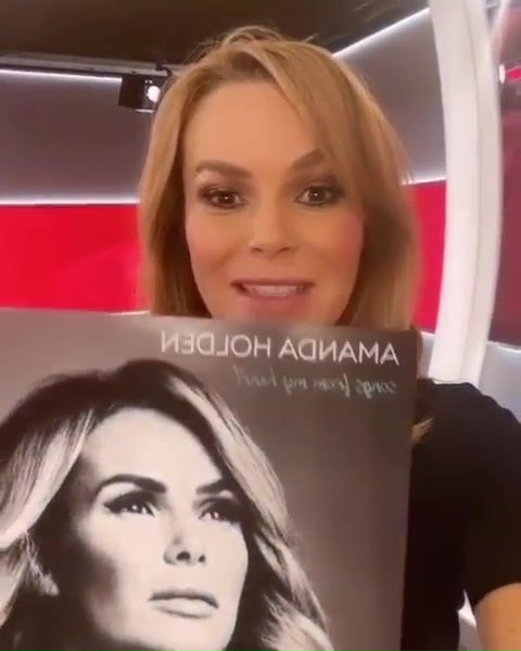 Amanda with her new album cover