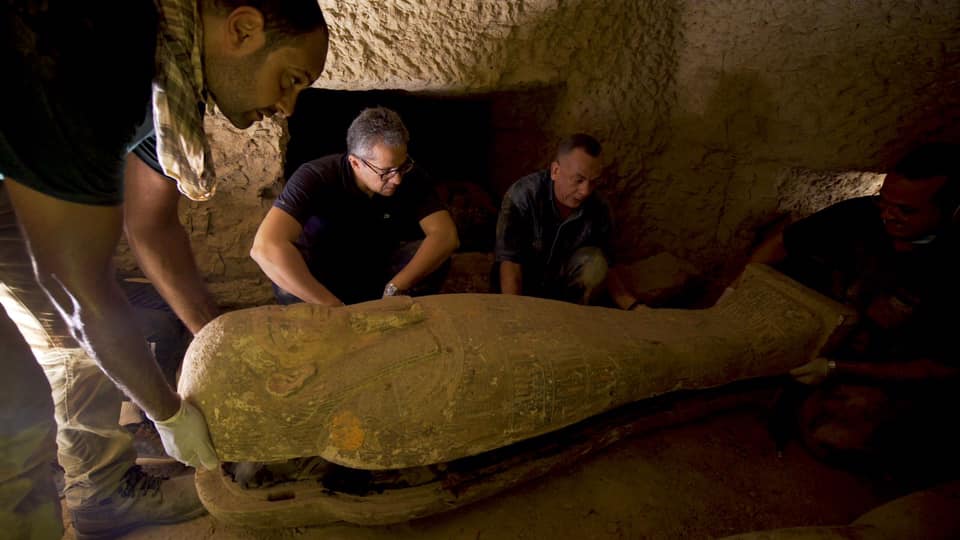 The archaeologists want to open all the coffins to find out about the individuals inside