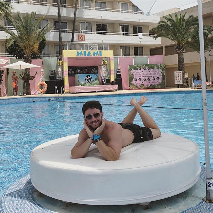  Layton Migas, of Bolton, in a pool while on holiday in Ibiza