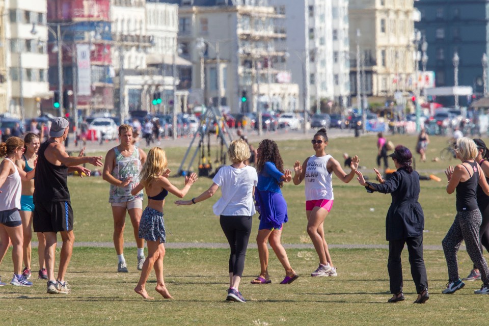 One group danced on Hove lawns in Brighton at lunchtime today 