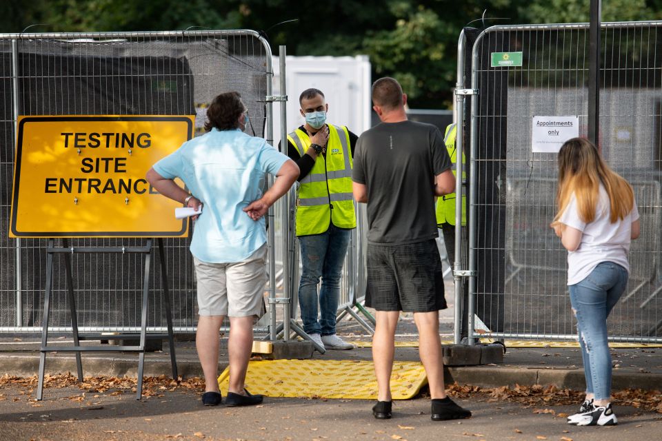 People queuing at a testing facility at Sutton Coldfield, Birmingham