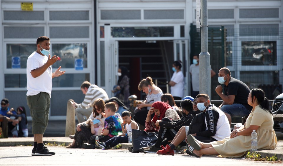 Hundreds of Brits queued up for tests in Bury, Greater Manchester today