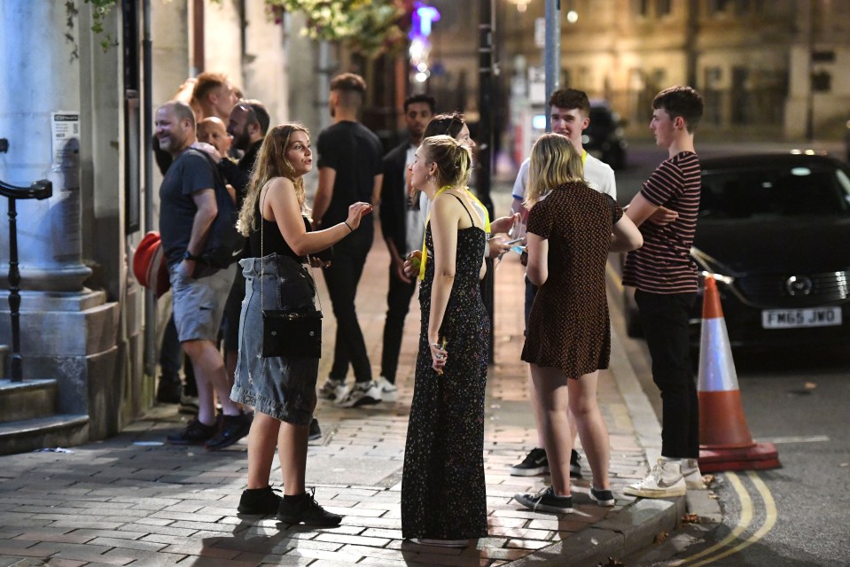 Pals chatted on the street during the night out