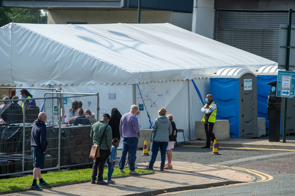 There were queues outside a testing centre in Oldham, Greater Manchester 