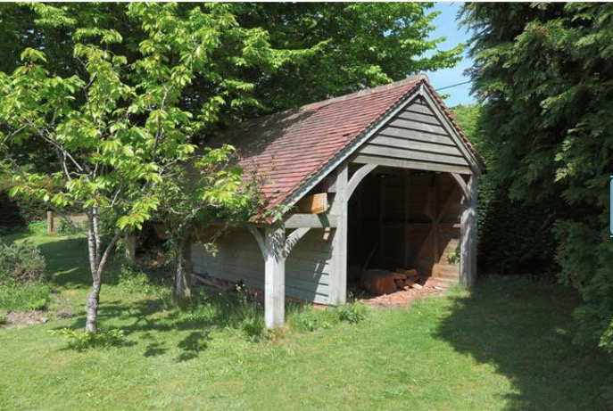 They even have a cute outdoor shed to keep their gardening tools safe