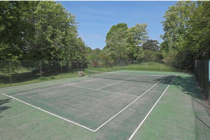 Zoe, Michael and her children can enjoy a spot of tennis on their very own court