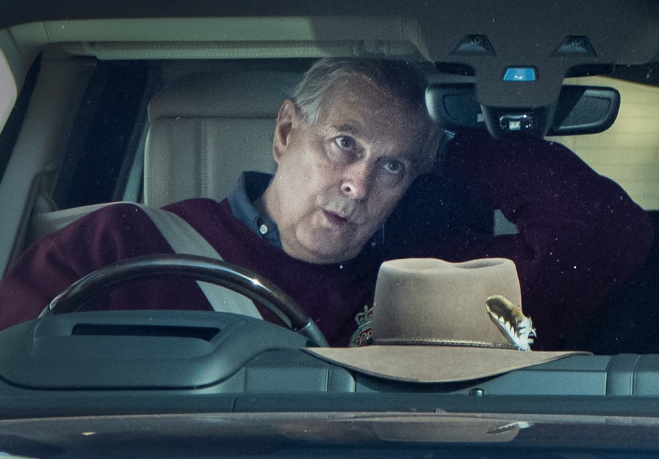 Prince Andrew was seen today checking his hair in the rear view mirror