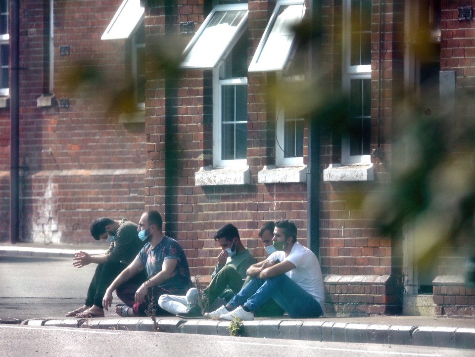 Around 400 migrants are being housed at Napier Barracks in Folkestone