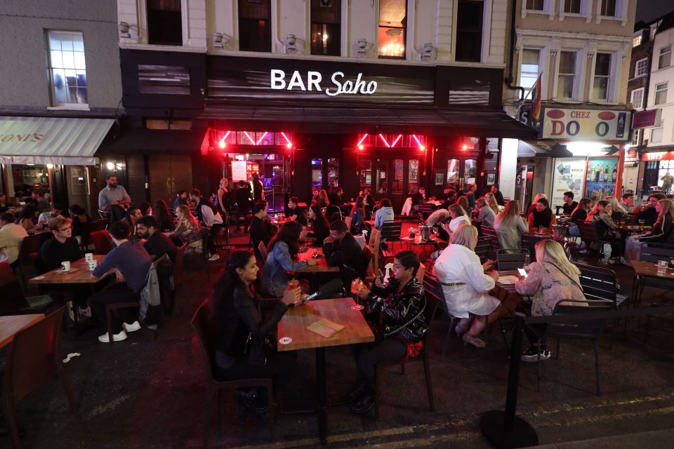 A busy bar in London - pictured ahead of the curfew changes