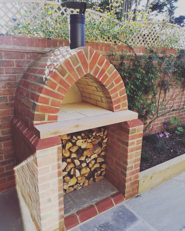 The married couple have their own pizza oven outside