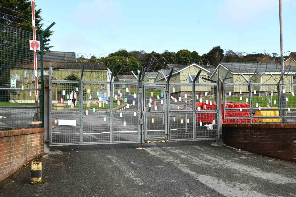 Some locals left messages of support on the gates of the complex