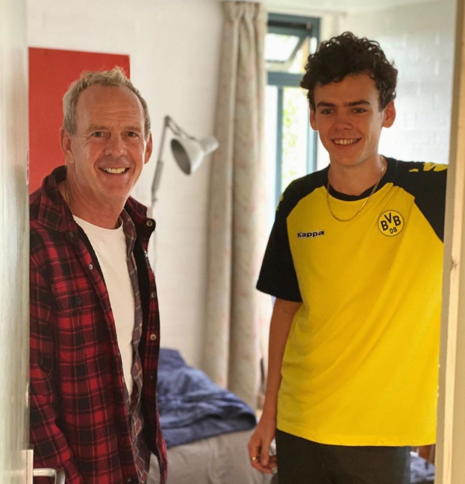 He posed for a snap with dad Norman at the student halls in Bristol