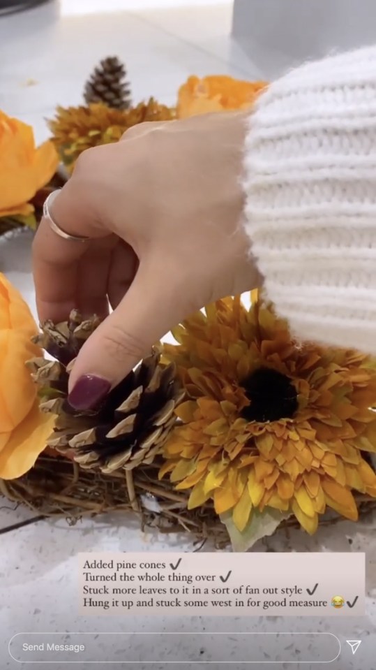 She added pine cones, flowers, extra leaves and even added some pumpkin lights