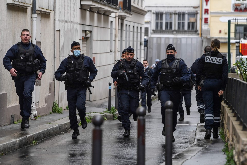 Police officers arrive following the rampage