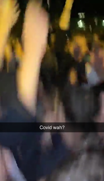 Footage taken at 1am this morning, captioned 'Covid wah?', shows hundreds of revellers dancing around a soundsystem outside Owens Park halls