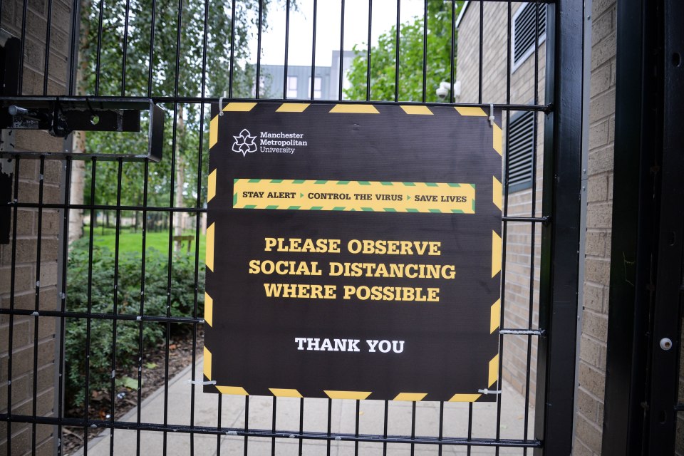 A sign at Manchester Met University pleads with students to social distance