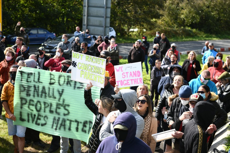 Protests have broken out near a camp housing around 200 migrants in Penally, Wales