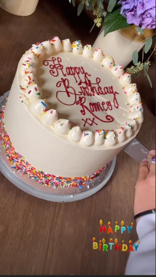 His cake was a white icing rainbow sponge, that read 'Happy Birthday Romeo xx'