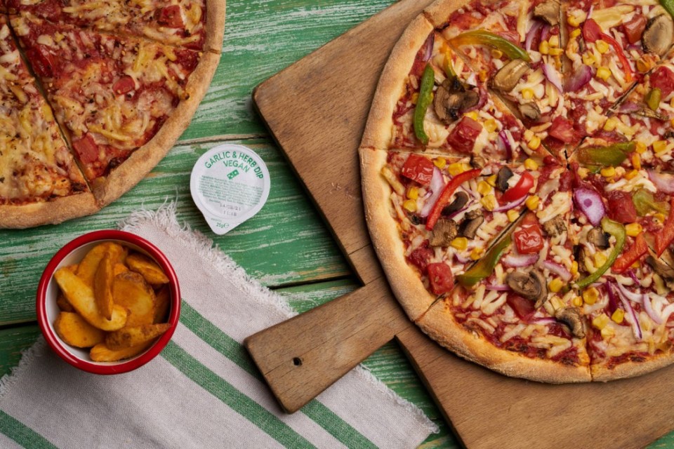 Domino's has launched two vegan pizzas and a vegan garlic and herb dip