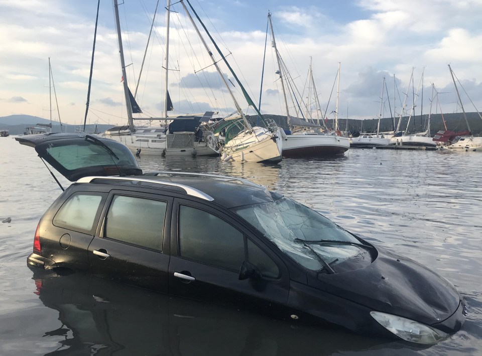 Cars and boasts swept away by the surging mini-tsunami