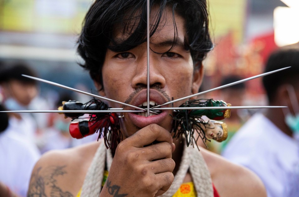 Believers take part in gruesome rituals to bring good luck