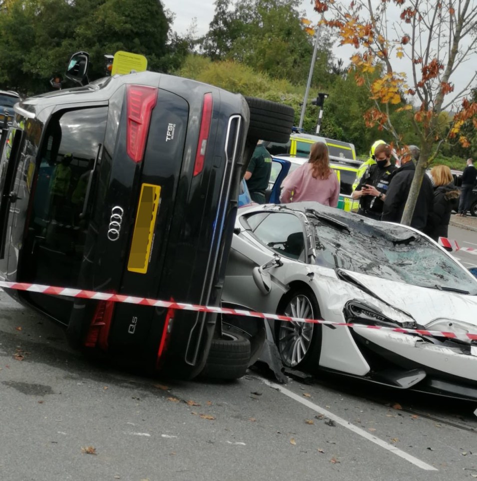 The Audi flipped on its side while the McLaren's roof was crushed in