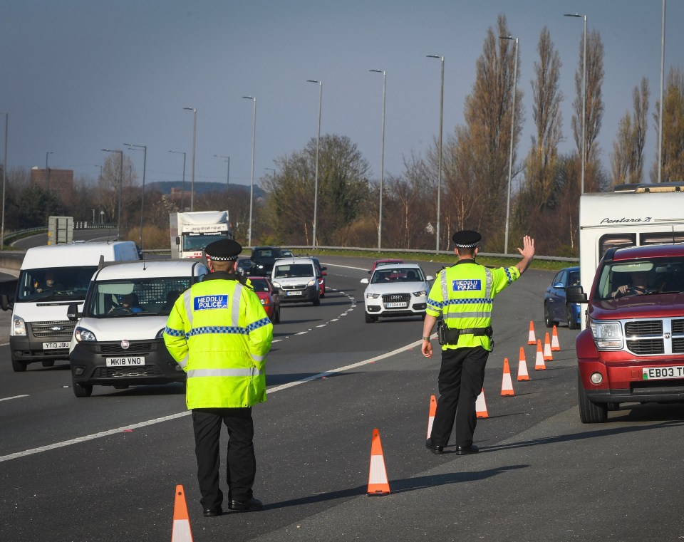 Police officers stopping cars arriving in Wales earlier in the year and are set to again