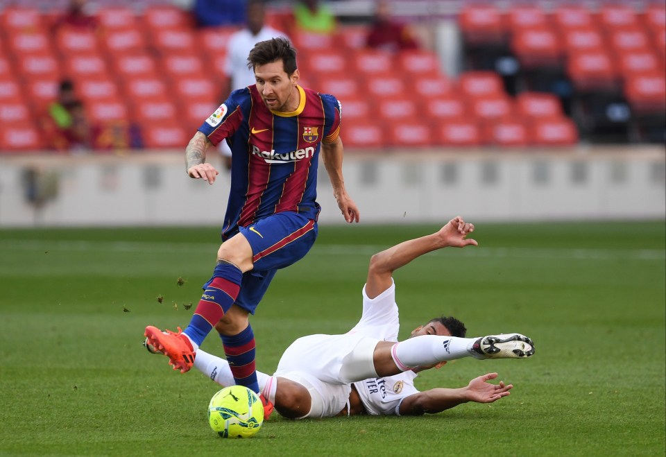 Casemiro was booked for this first half swipe at Messi