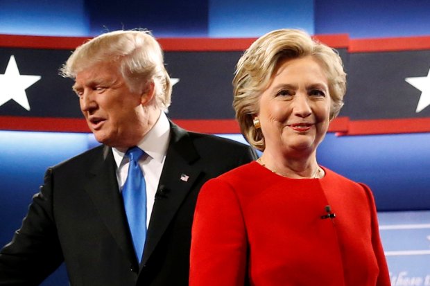 Trump and Clinton greet one another as they take the stage for their first debate