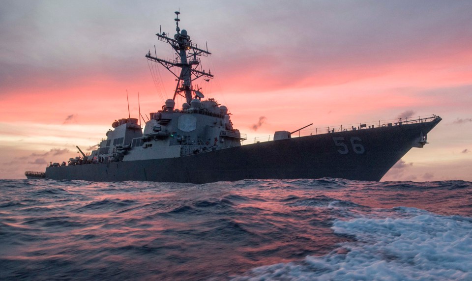 Chinese warships swarmed this US destroyer, the John S. McCain, as it made its way through the South China Sea on Friday