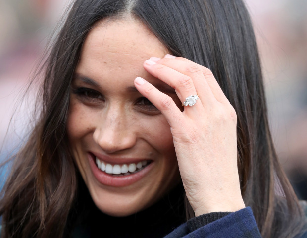 Meghan wore her everyday jewellery - her trilogy engagement ring 