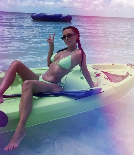 She flaunted her wealth in a series of holiday snaps