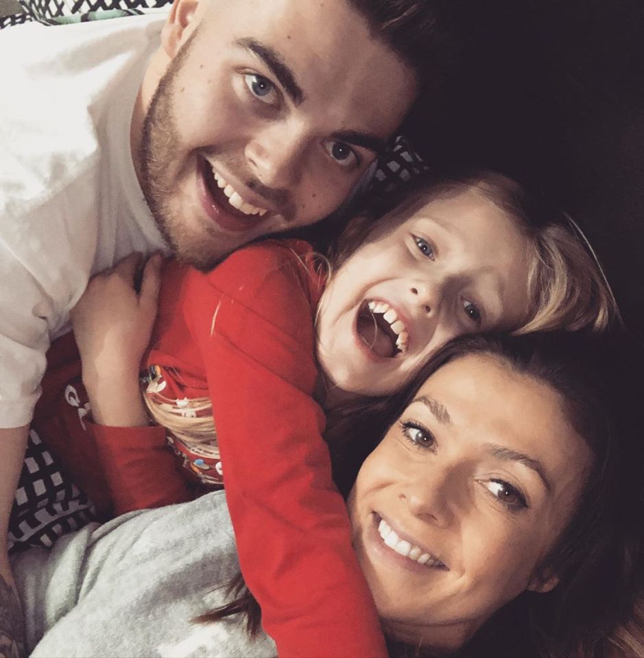 Kym pictured with daughter Polly, nine, and son David, 25