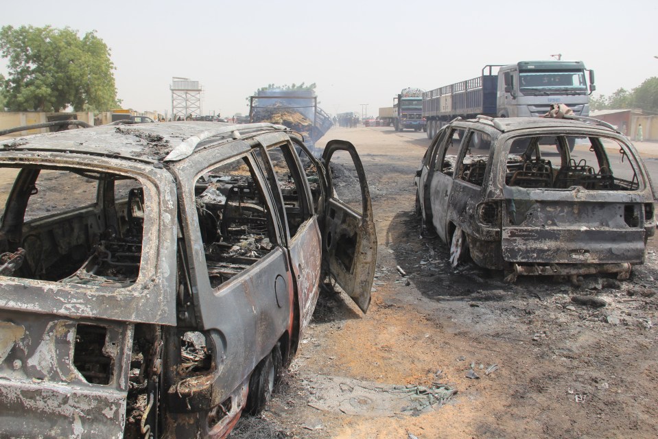 Cars burnt down by suspected members of the Islamic State West Africa Province (ISWAP) during an attack on February 9 this year