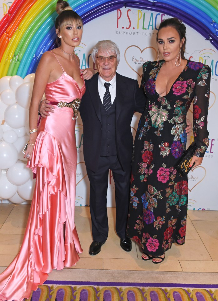 Bernie Ecclestone poses with his daughters Petra and Tamara