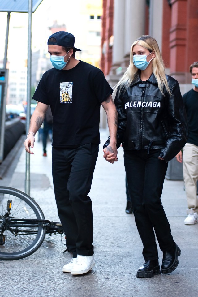 The pair looked incredibly stylish and wore face protective face coverings