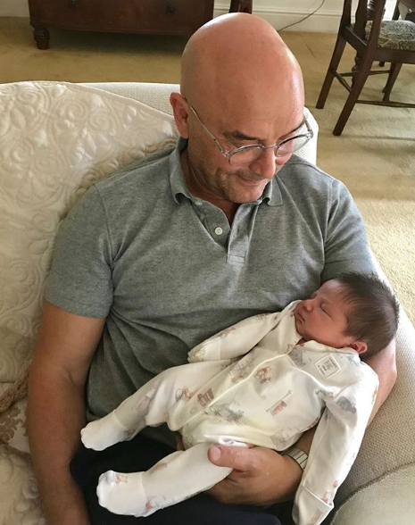 Gregg with his son, Sid, as a newborn