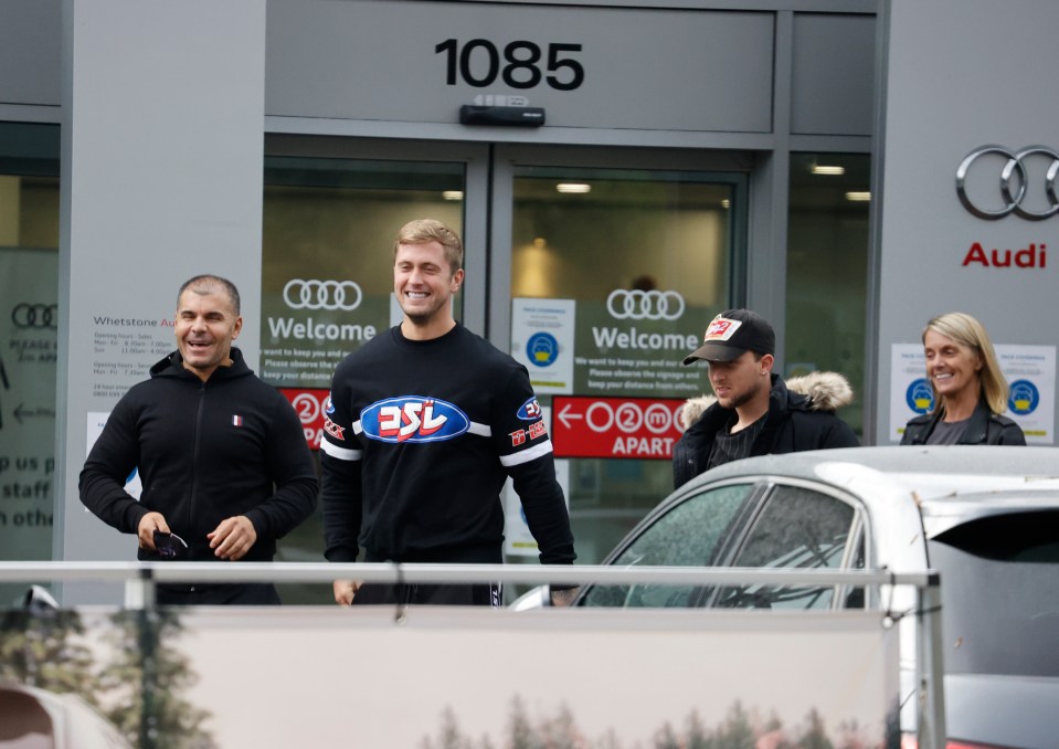 The star was seen grinning as he arrived at the Whetstone dealership