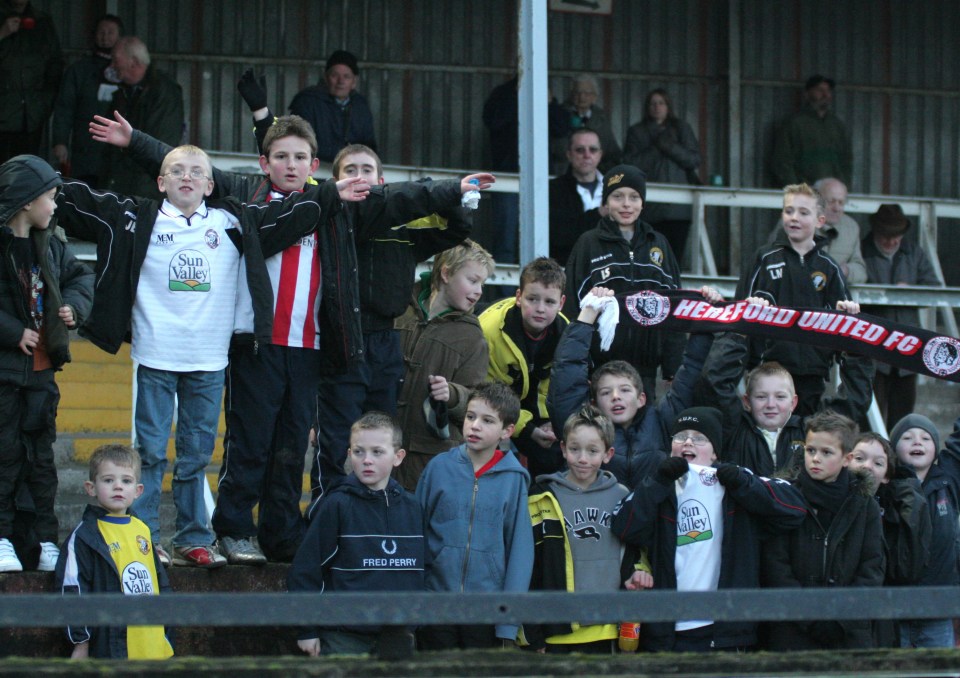 Bowen, left in white Hereford shirt and glasses, would go along to Edgar Street to watch his local team as a youngster