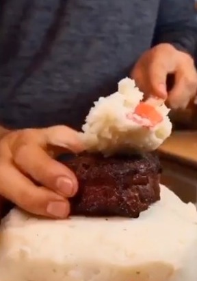 The unusual cake was made of cooked meat and smothered in mash