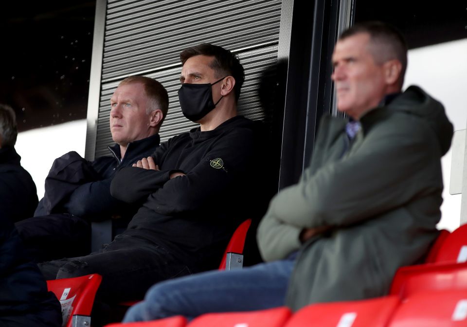 Paul Scholes (left) watched on with Gary Neville and Roy Keane as Salford drew on Saturday